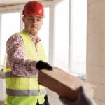 close-up-men-working-construction_23-2148751990