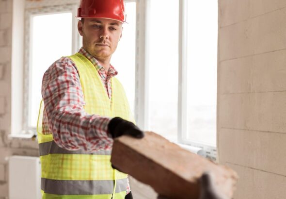 close-up-men-working-construction_23-2148751990