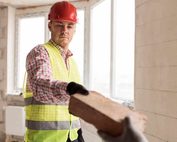 close-up-men-working-construction_23-2148751990