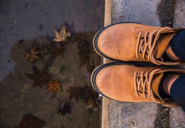 leather-boots-standing-edge_23-2147869619