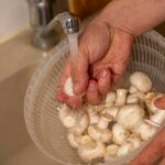 male-hands-wash-champignons-kitchen-sink_209484-22600
