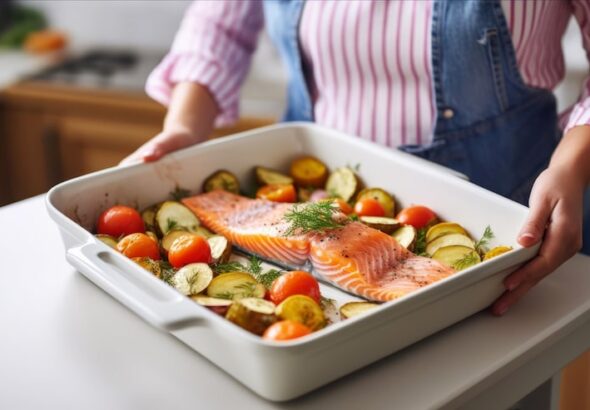 person-is-holding-tray-fish-vegetables_1000124-287317