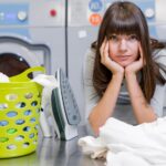 tired-beautiful-woman-laundry-room_23-2148386969