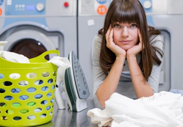 tired-beautiful-woman-laundry-room_23-2148386969
