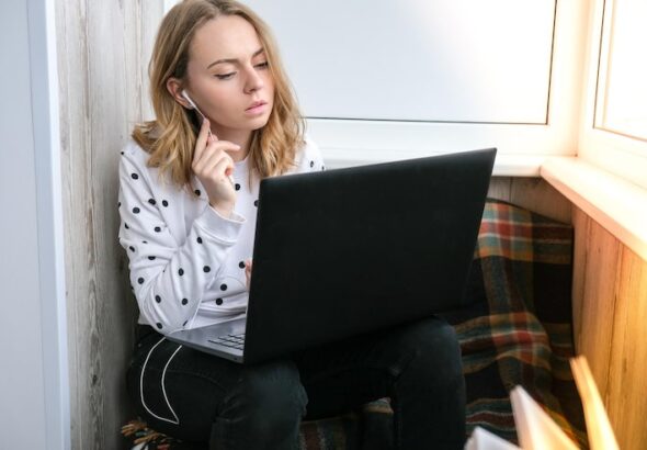 young-woman-sitting-balcony-laptop-online-education-stay-home-concept-work-from-home_1033085-574