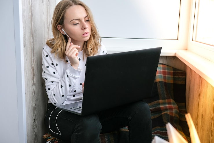 young-woman-sitting-balcony-laptop-online-education-stay-home-concept-work-from-home_1033085-574